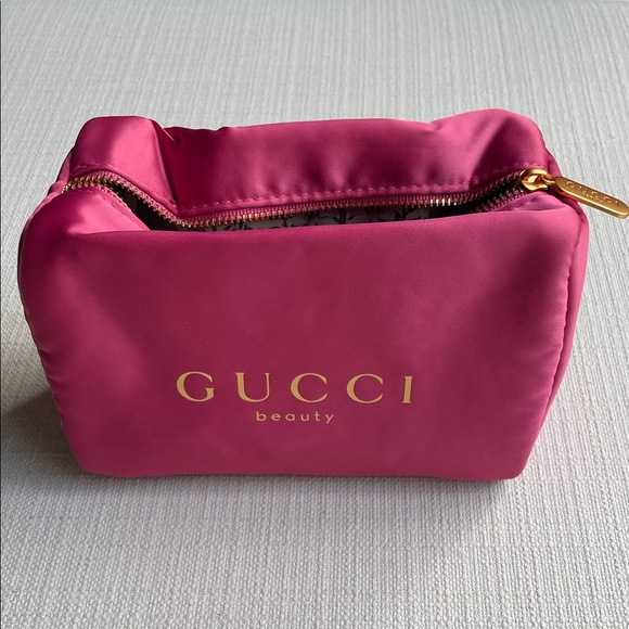 Gucci Handbags - Gucci Beauty Pink Satin Cosmetic Pouch with Gold Logo